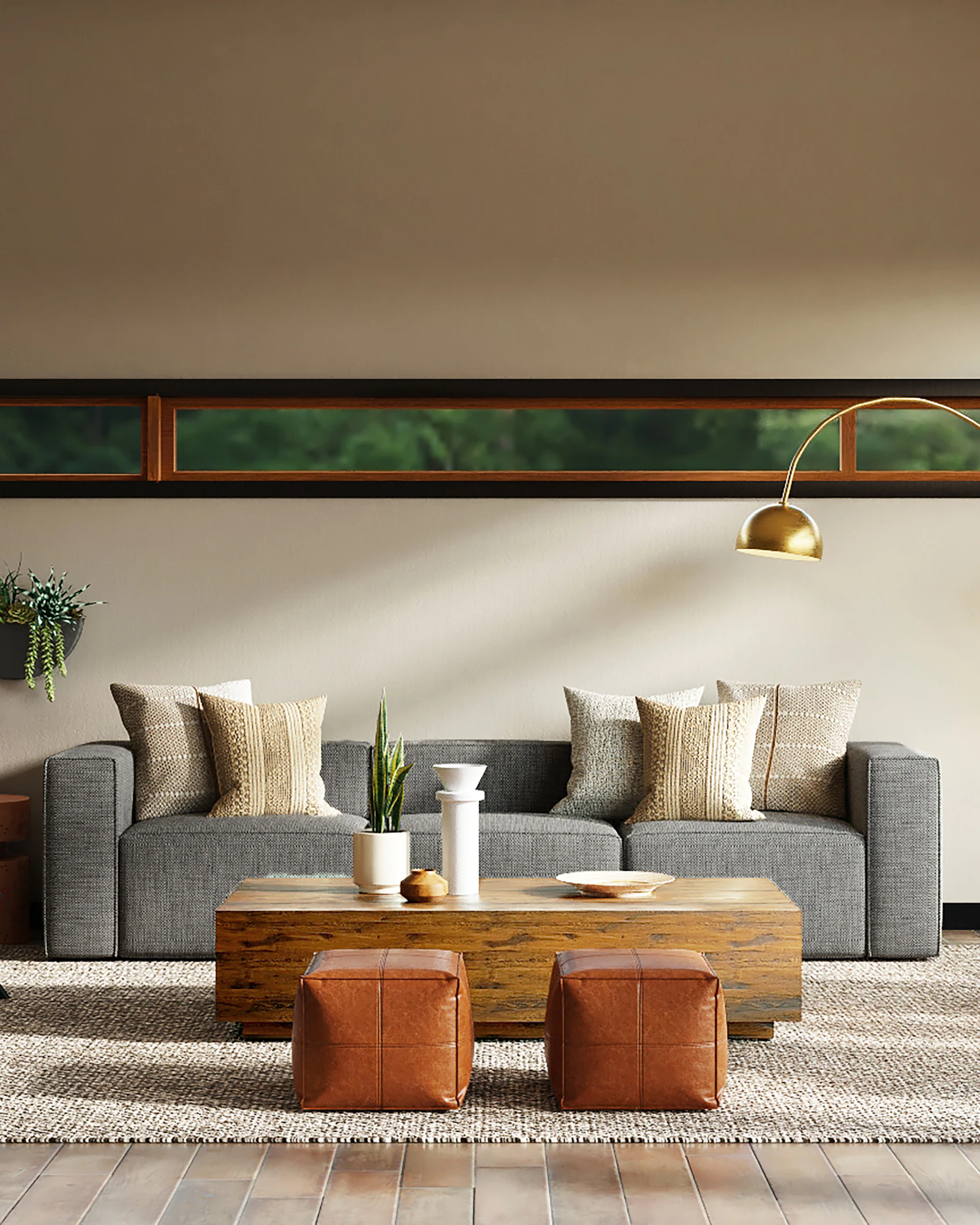 Sunlit living space with a pale sofa, wood floor, and tall windows.